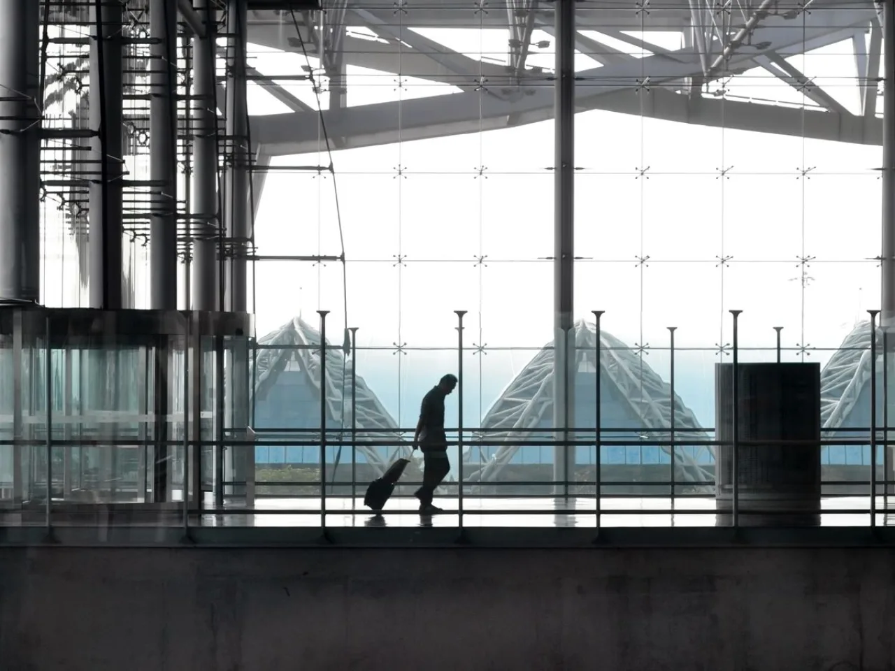 Arrival in Istanbul — traveller with a suitcase in the terminal